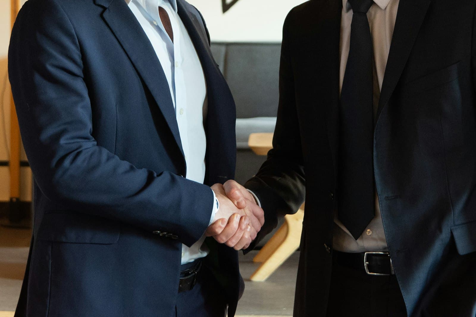 Two business partners shaking hands